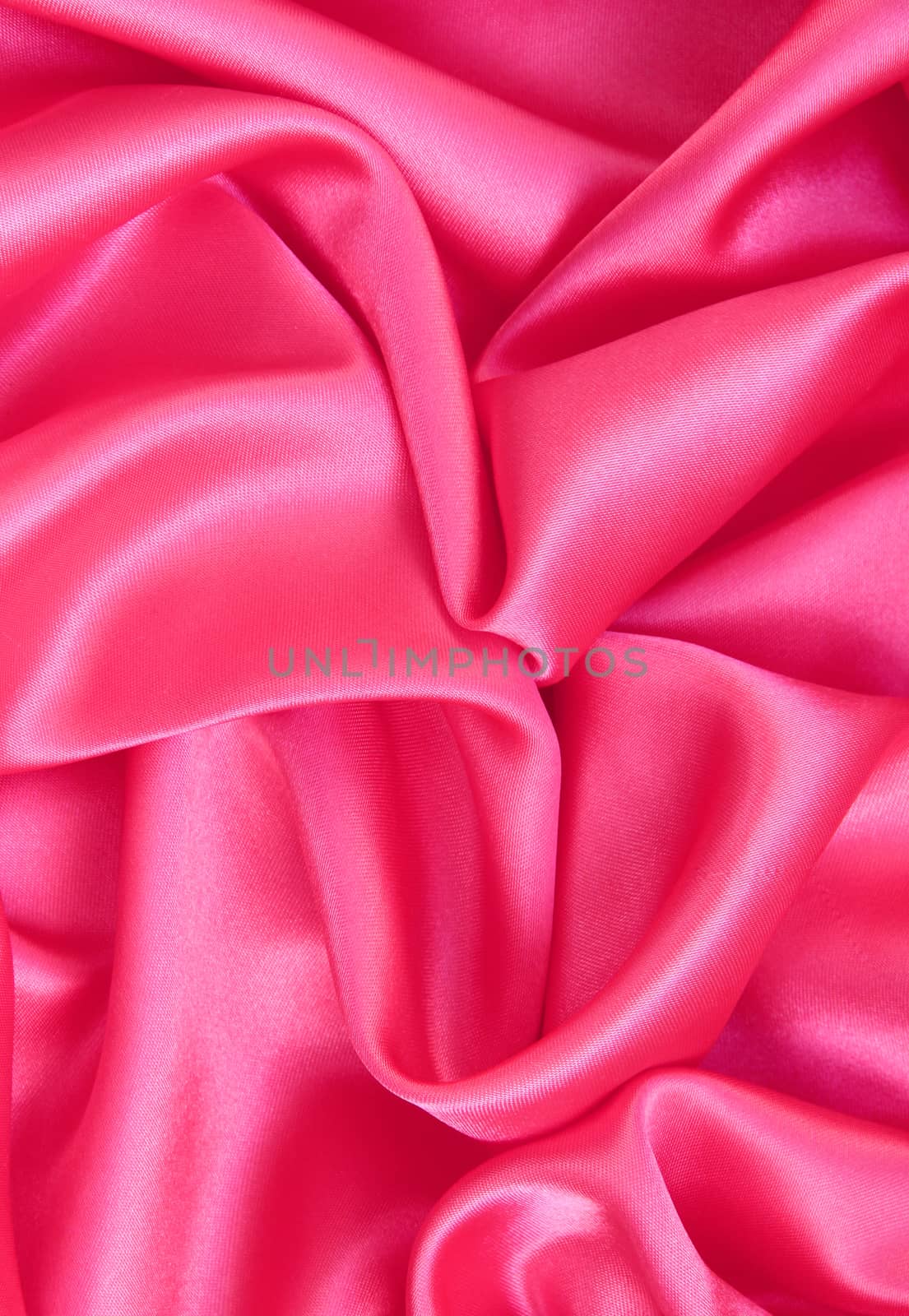 Smooth elegant pink silk or satin as background  by oxanatravel