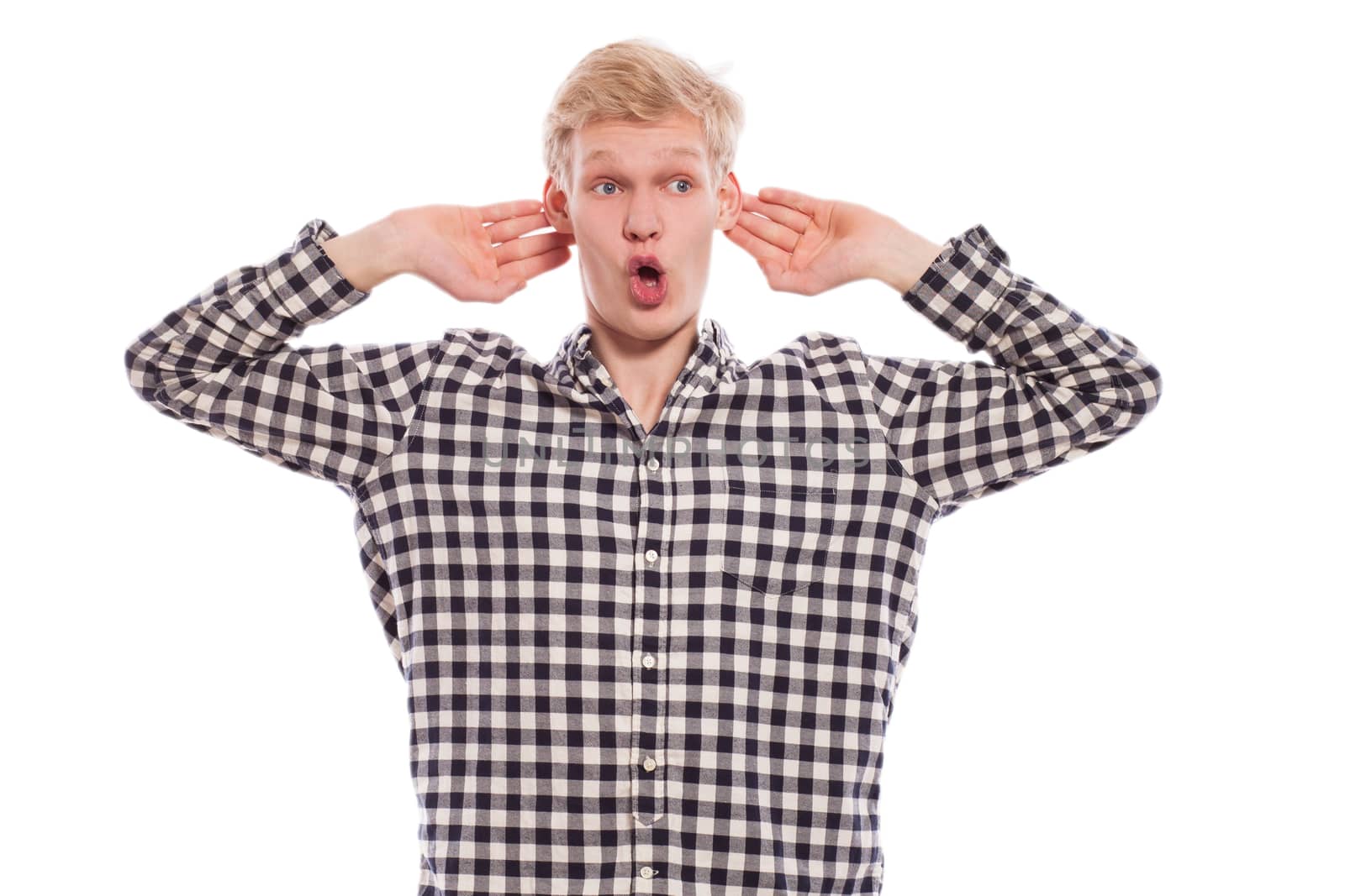 Portrait of young handsome guy over white background