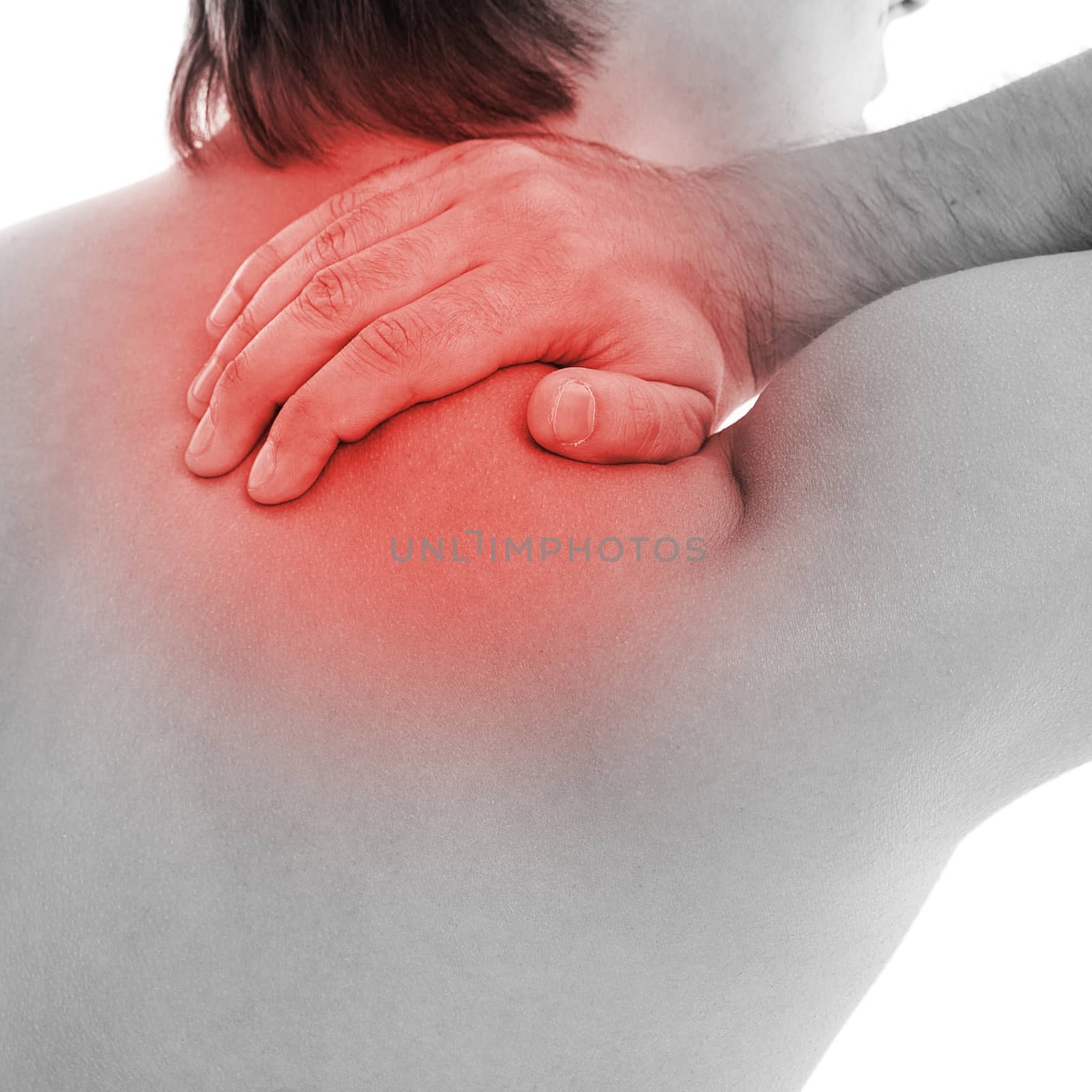 Man is touching his back because it aches