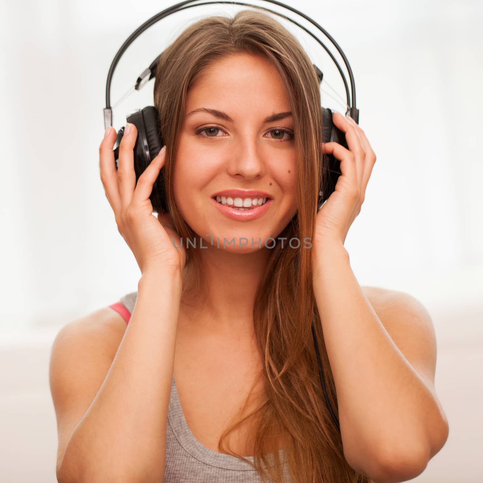 Beautiful woman enjoy music in headphones by rufatjumali