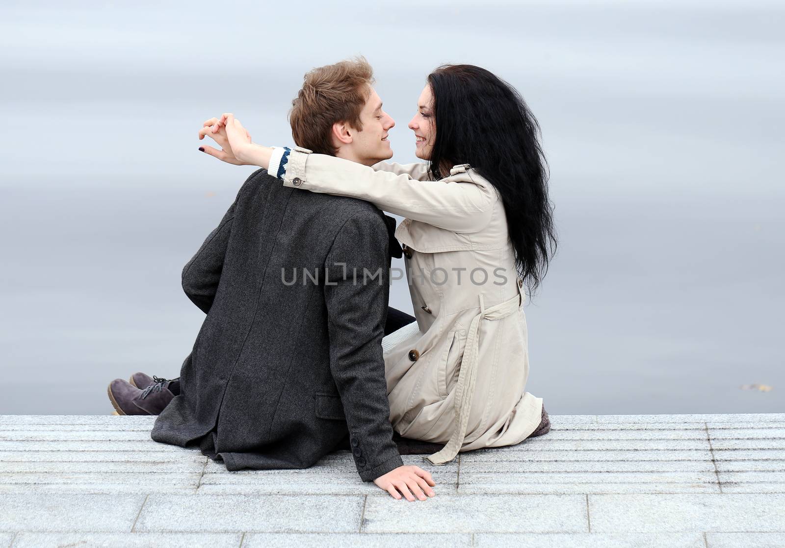 Beautiful couple outdoors by rufatjumali