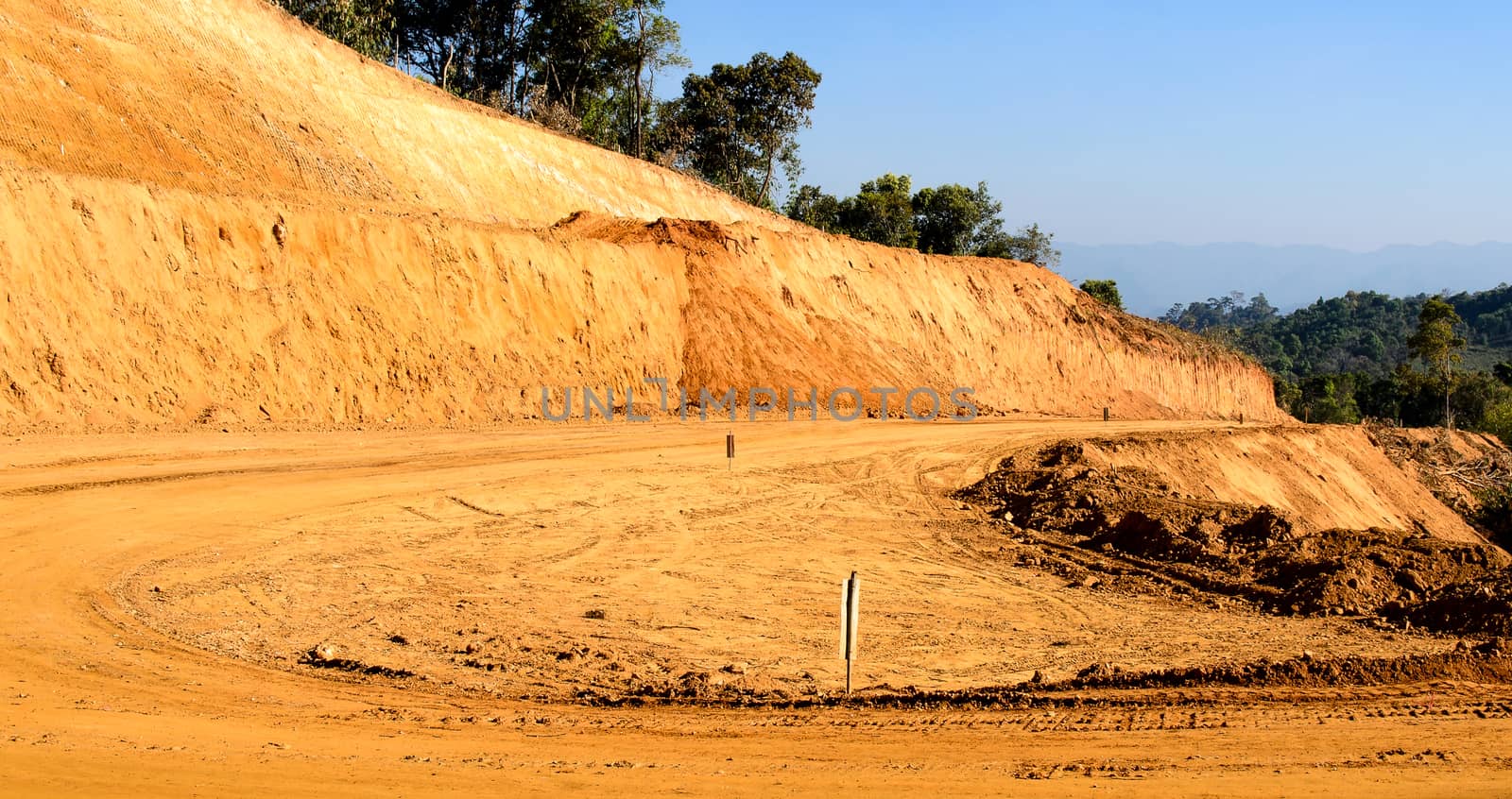 The Laterite Non-asphalt Road Under Construction in the north of Thailand.