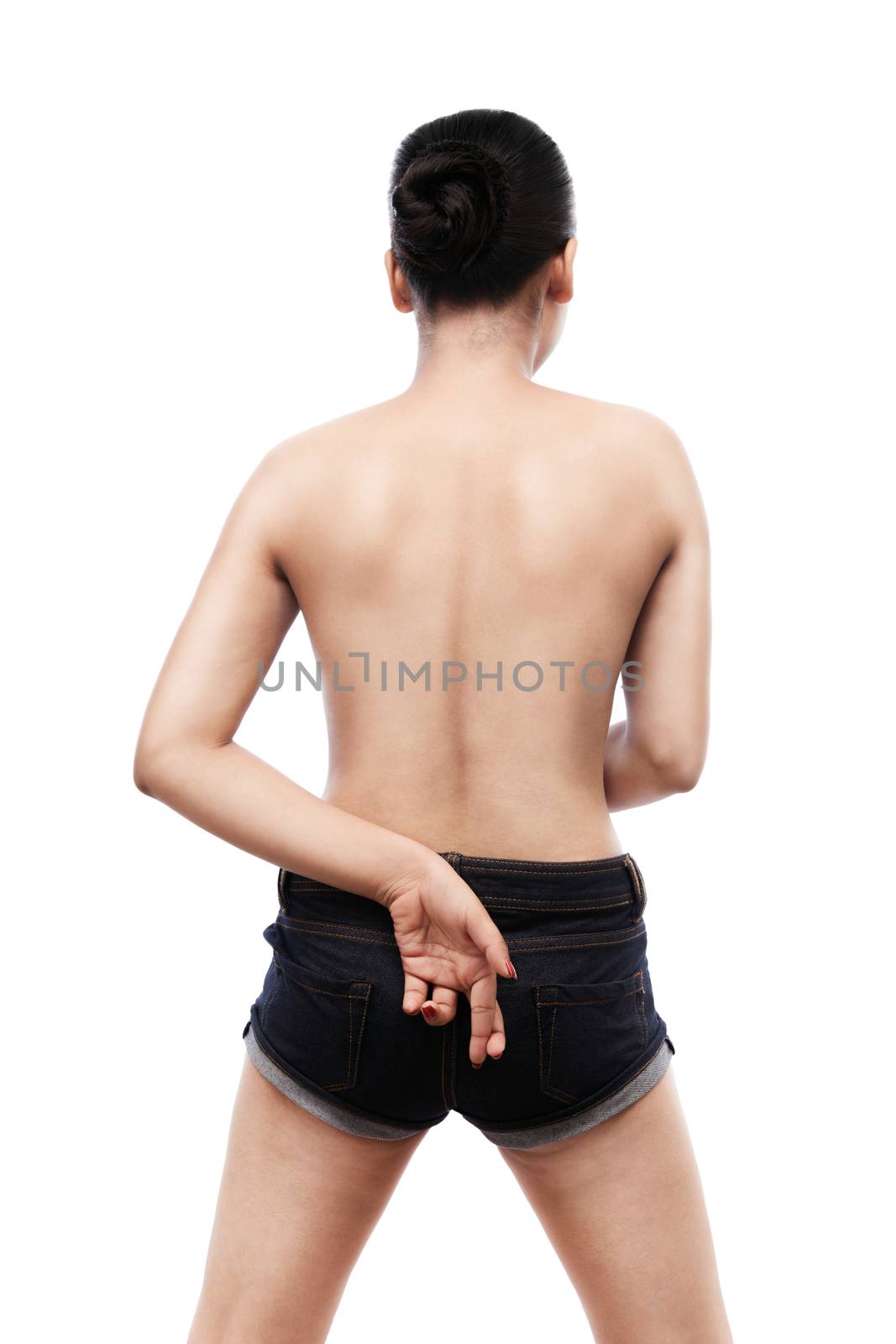 Indian young woman with 'No Sex' sign showing her smooth skinned back and wearing blue jeans isolated on white