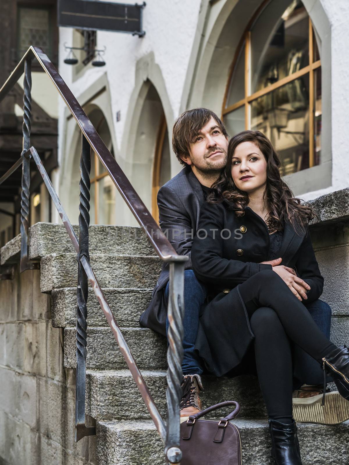 Couple sitting and resting in the city by sumners