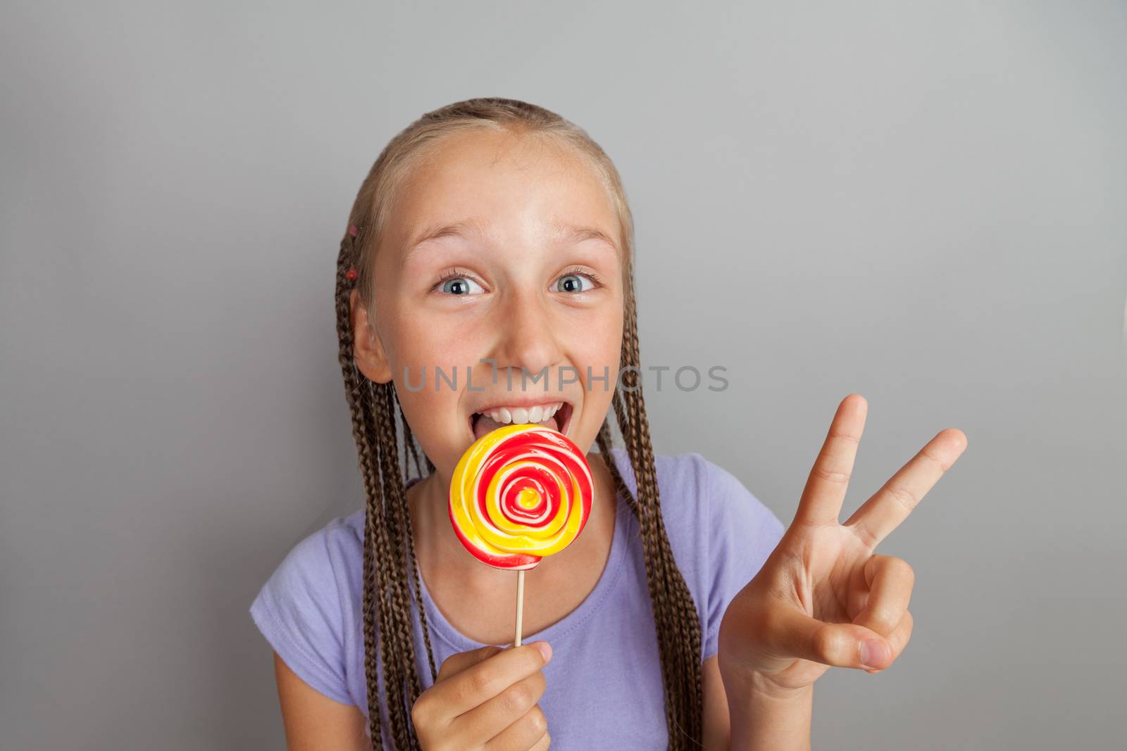 happy girl woman with lollipop