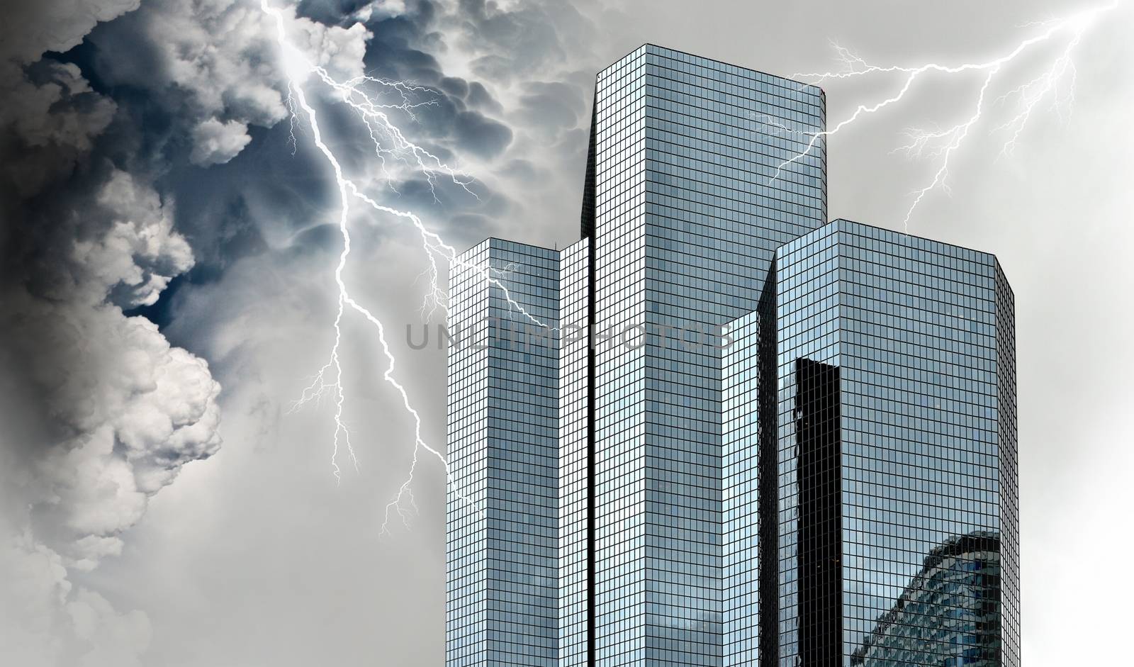 Financial and economic crisis concept with giant storm over financial buildings.