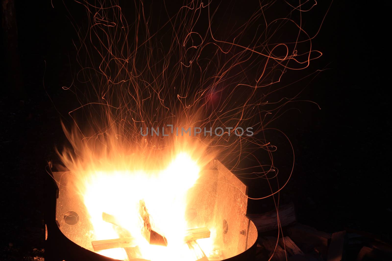 Camp Fire burning in fire ring early fall