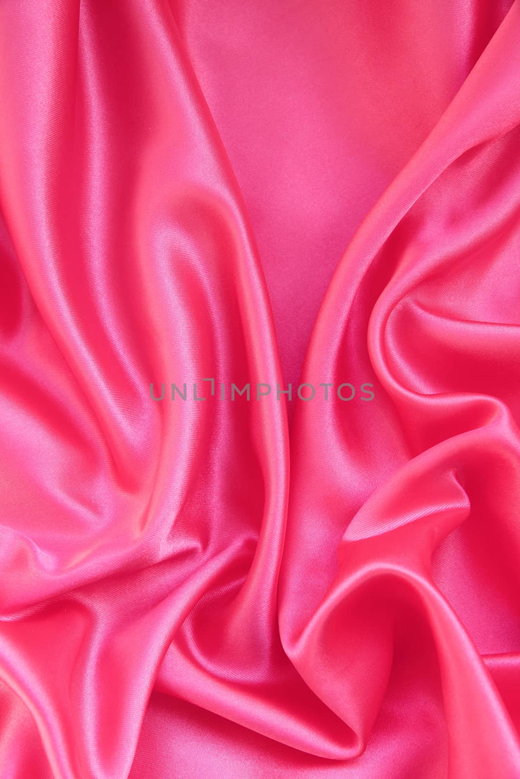Smooth elegant pink silk or satin can use as background 