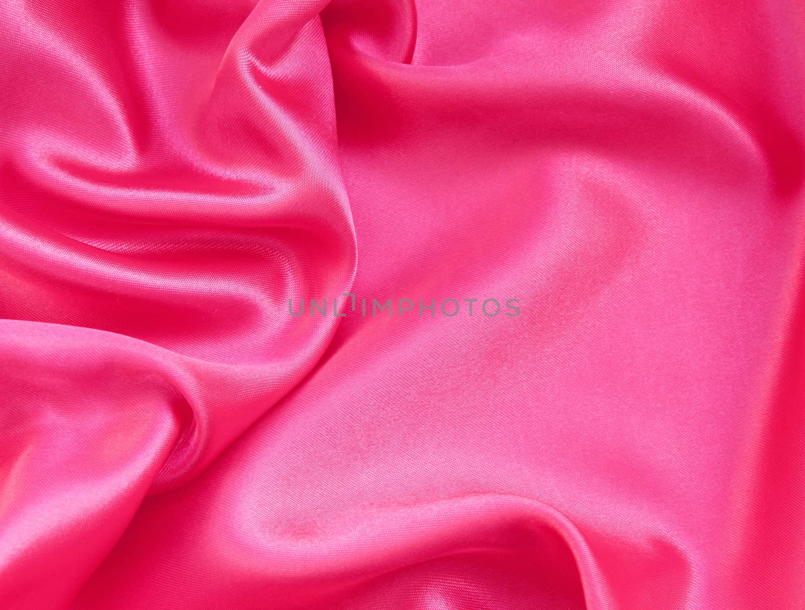 Smooth elegant pink silk or satin can use as background 