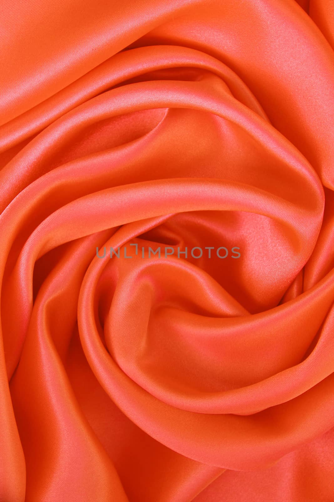 Smooth elegant orange silk or satin can use as background 