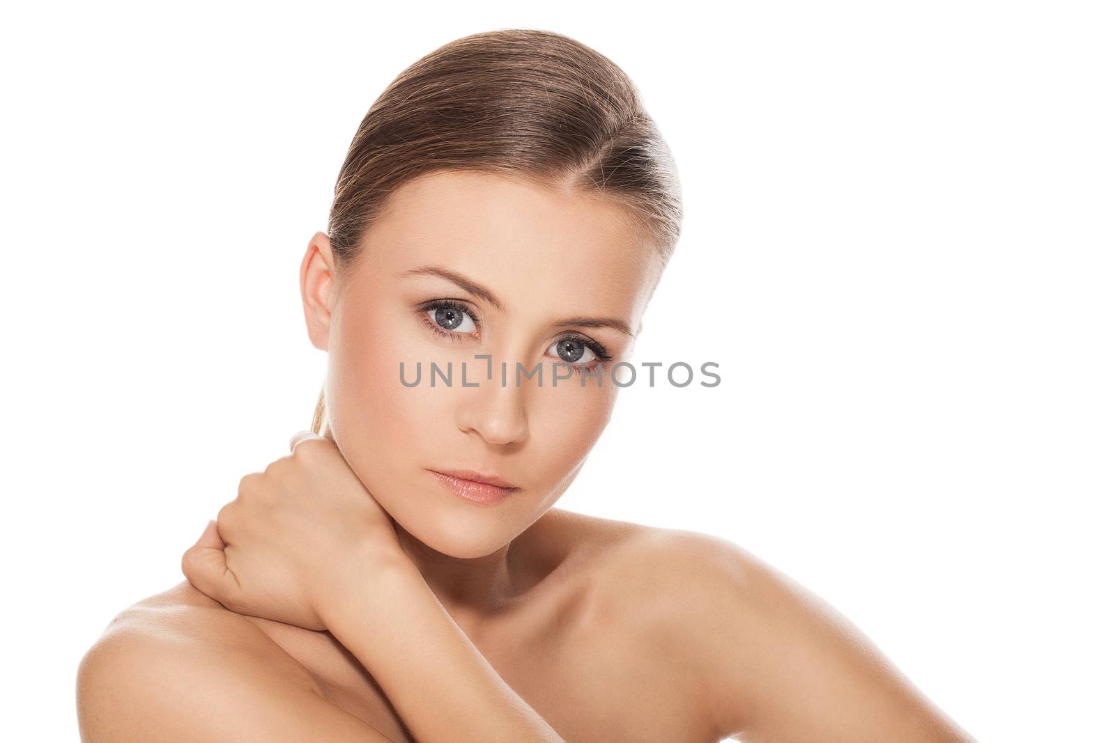 Beautiful natural caucasian woman over white background