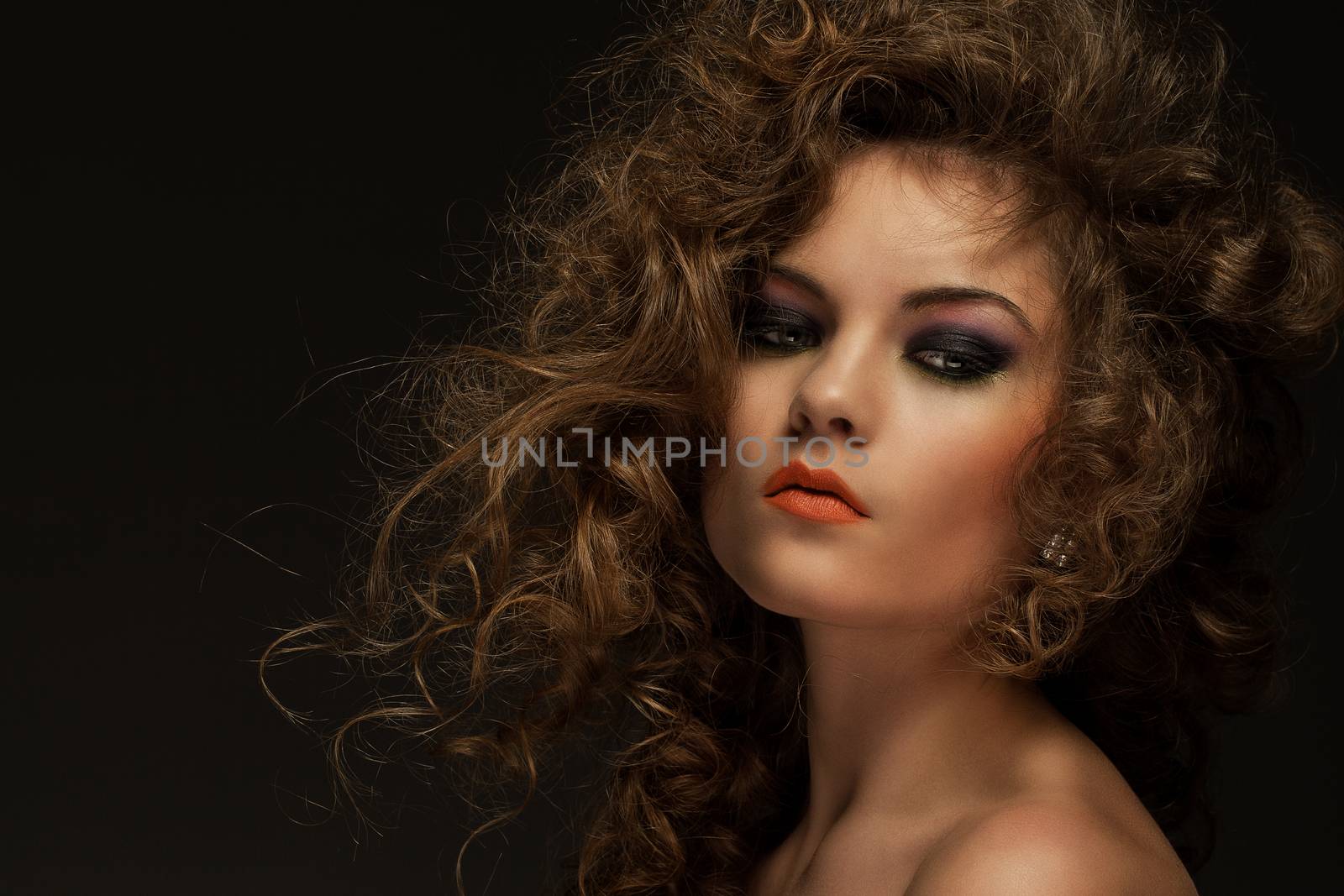 Beautiful woman with curls and makeup by rufatjumali