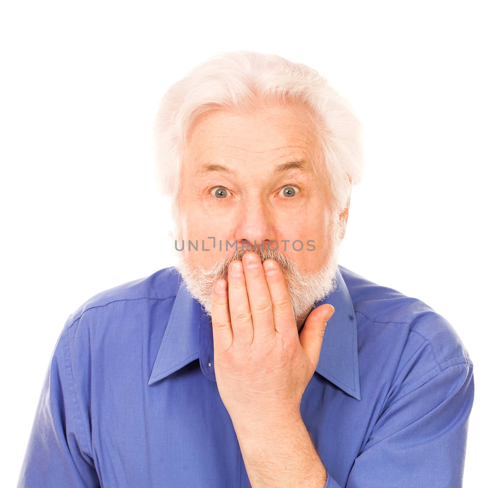 Elderly man holds hand on mouth isolated over white background