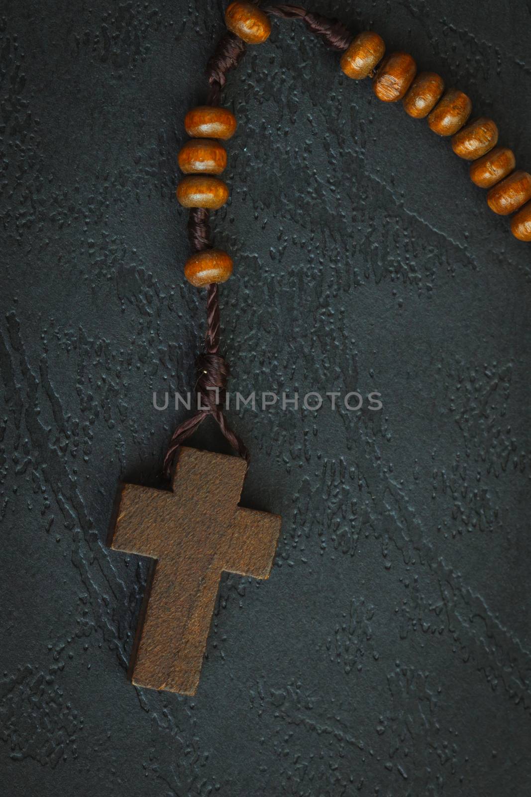 Christian cross necklace on Holy Bible book, Jesus religion concept as good friday or easter festival