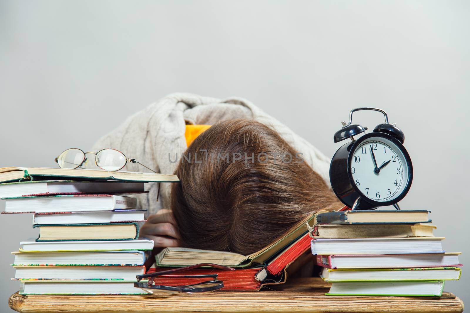 girl student with glasses reading books by anelina