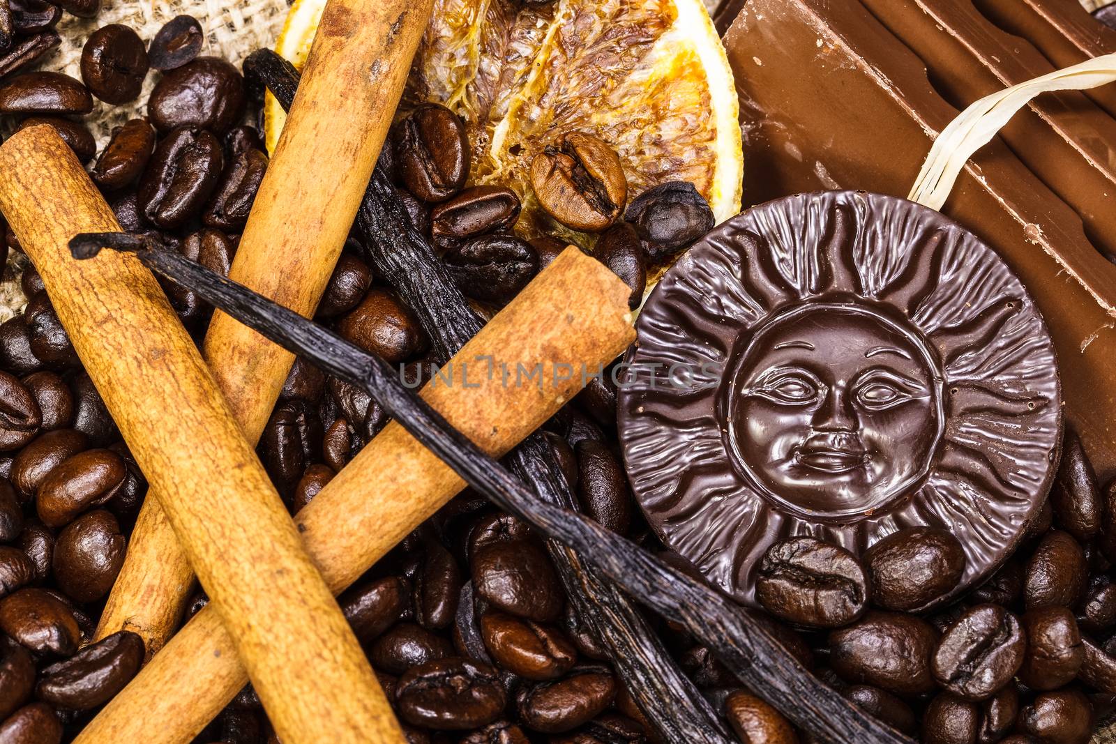 Coffee, chocolate, cinnamon sticks, vanilla beans
