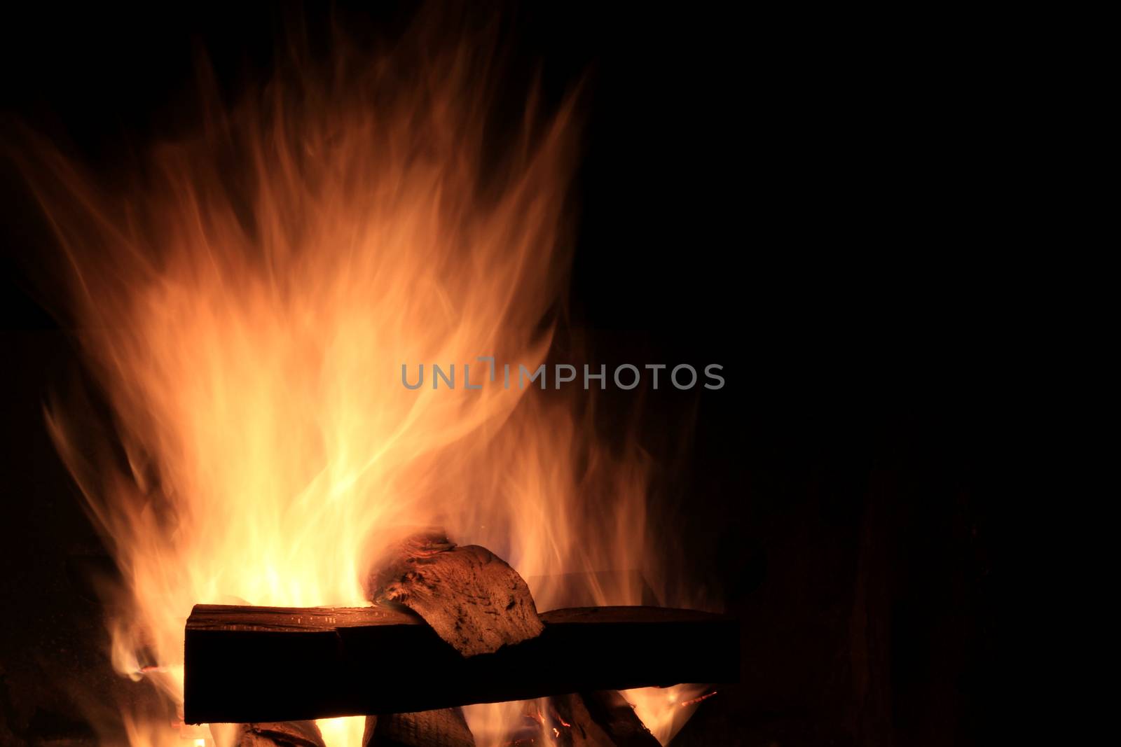 Camp Fire burning in fire ring early fall