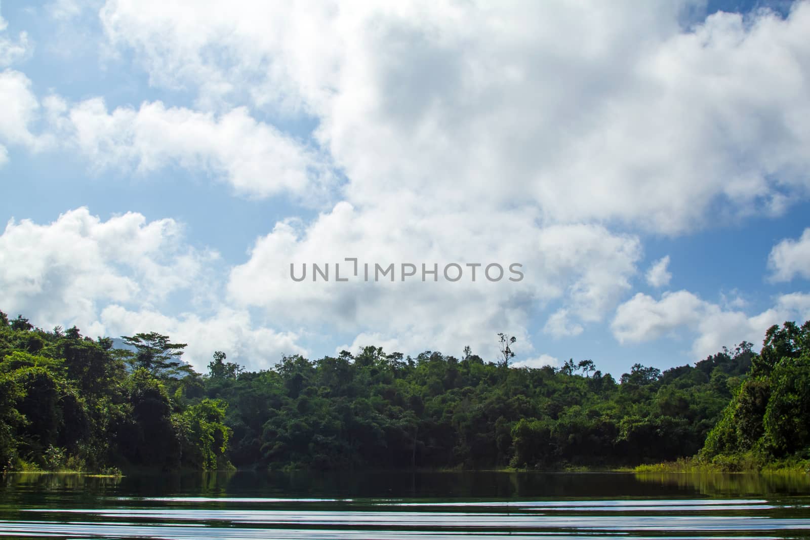 Lake mountain with clouds and blue sky