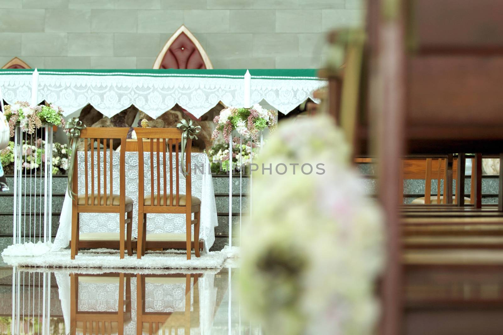 Table set for bride and groom in church