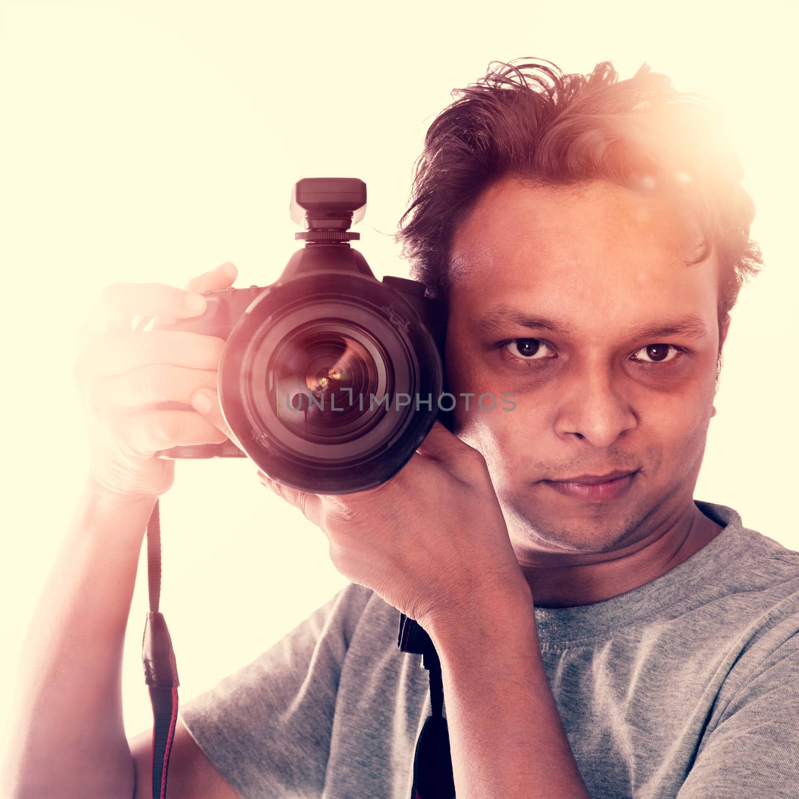 Creative Indian Photographer taking photo with camera