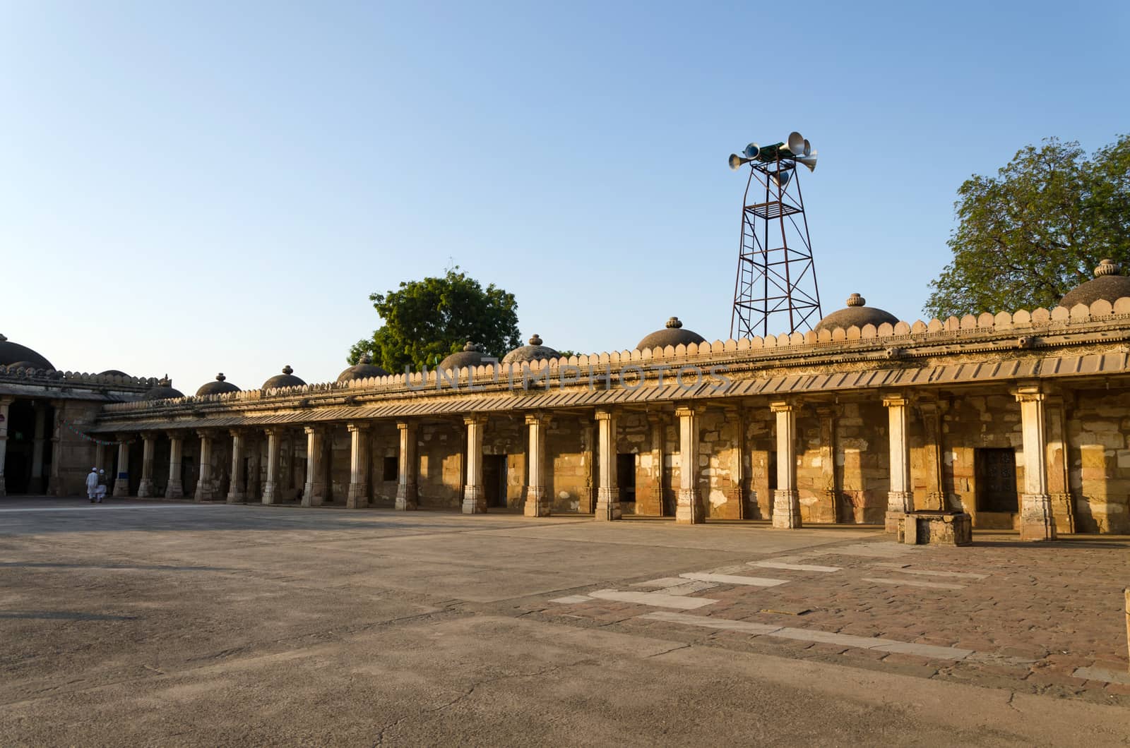 Colonnaded cloister of historic Tomb of Mehmud Begada, Sultan of Gujarat at Sarkhej Roza mosque in Ahmedabad, India