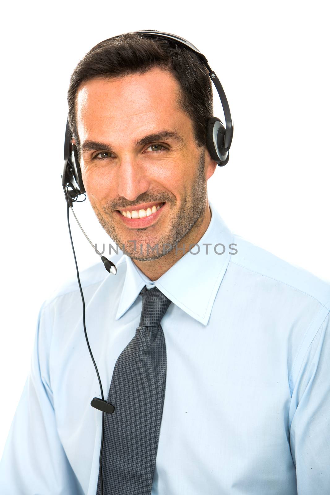 Portrait of a smiling man with headset working as a call center operator