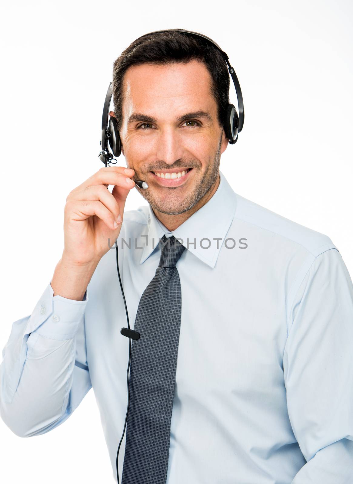 Portrait of a smiling man with headset working as a call center operator