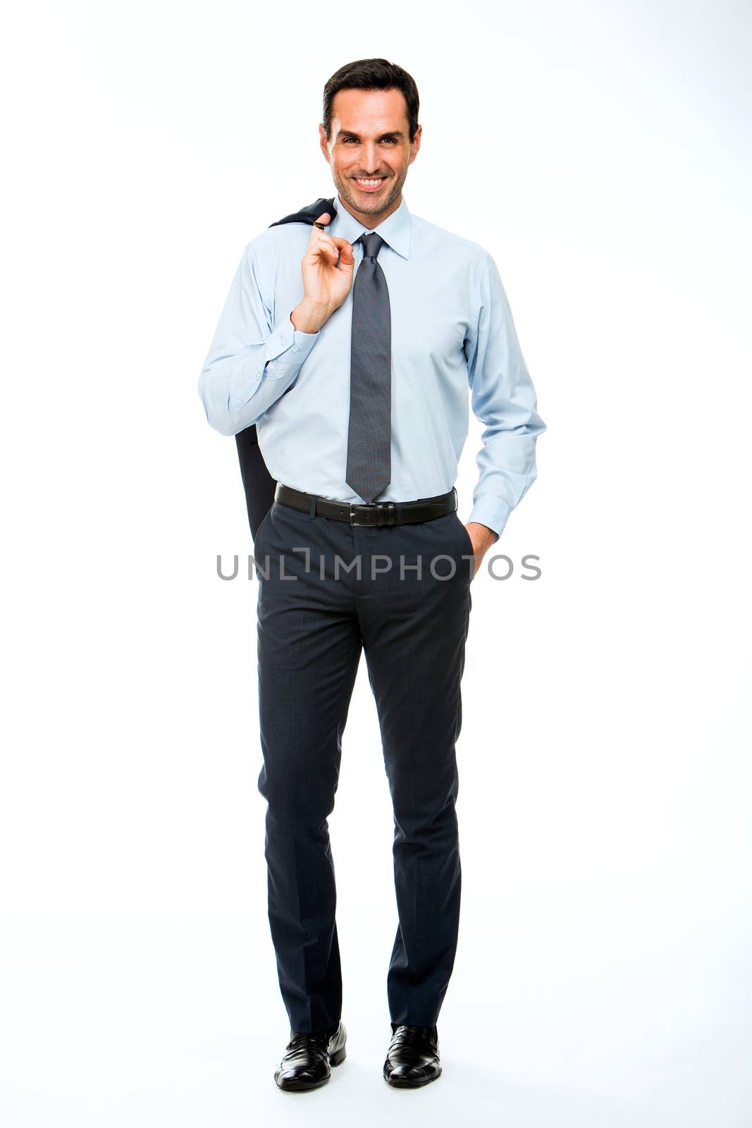 businessman holding jacket by Flareimage