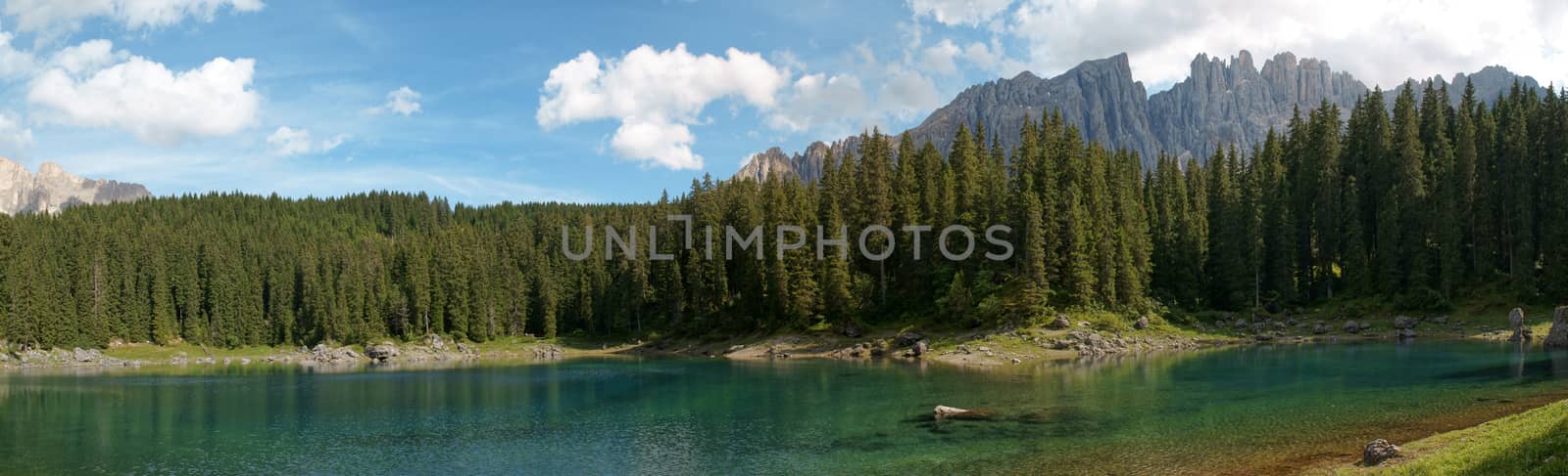 Scenic panorama of Carezza lake in the italian region of Trentino-Alto Adige (South Tyrol) and the Dolomites