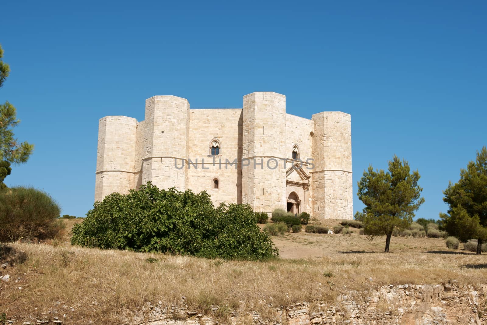 Castel del Monte (Castle of the Mount) is situated on a solitary hill, in the southeast italian region of Apulia, near Andria in the province of Bari. It was built in the 13th century during the reign of the Holy Roman Emperor Frederick II. The castle is an octagonal prism with an octagonal bastion at each corner. Each floor has 8 rooms and an octagonal courtyard in its centre. From 1996 is a World Heritage Site of UNESCO.