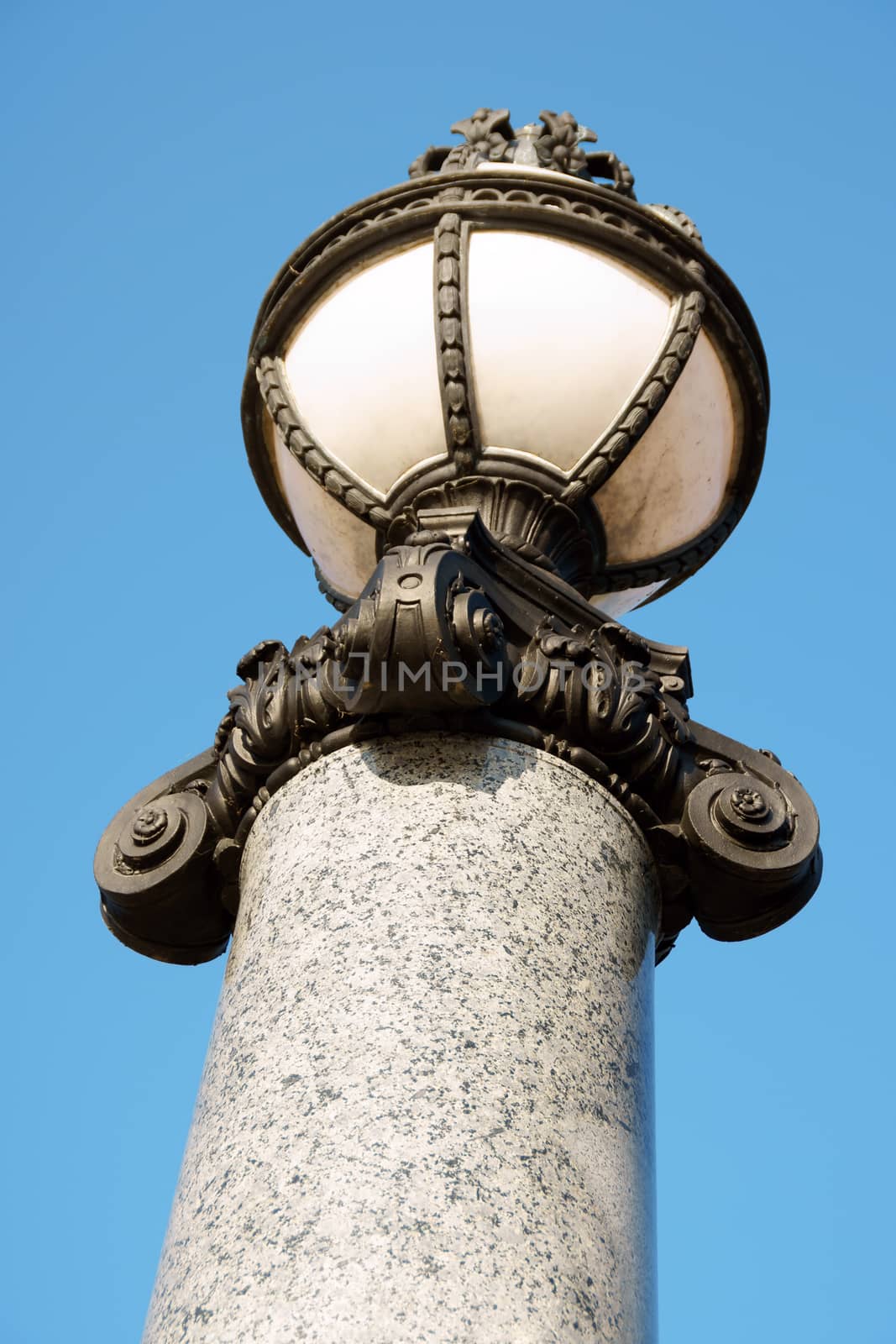 Art Nouveau street lamp against the blue sky from Museum Island in Berlin