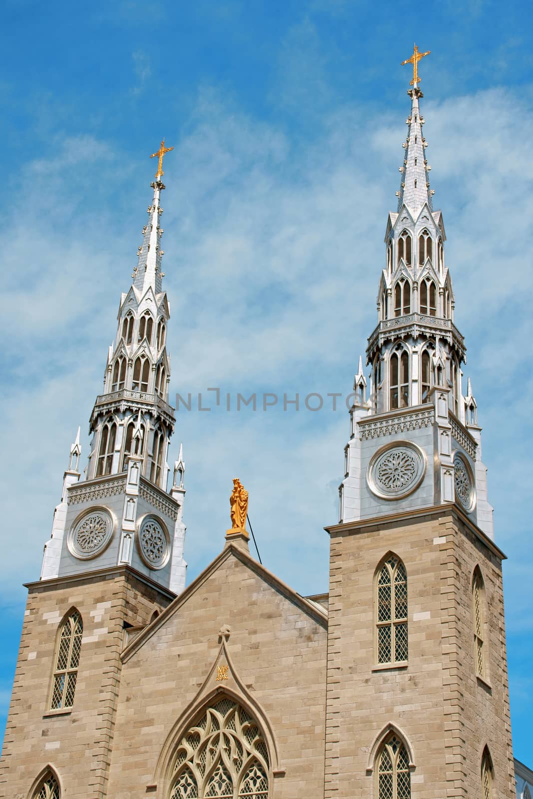 The facade of Notre Dame Cathedral Basilica in Ottawa with it's two silver towers. The neo-gothic Basilica is the oldest church in Ottawa and the seat of the city's Catholic  archbishop.