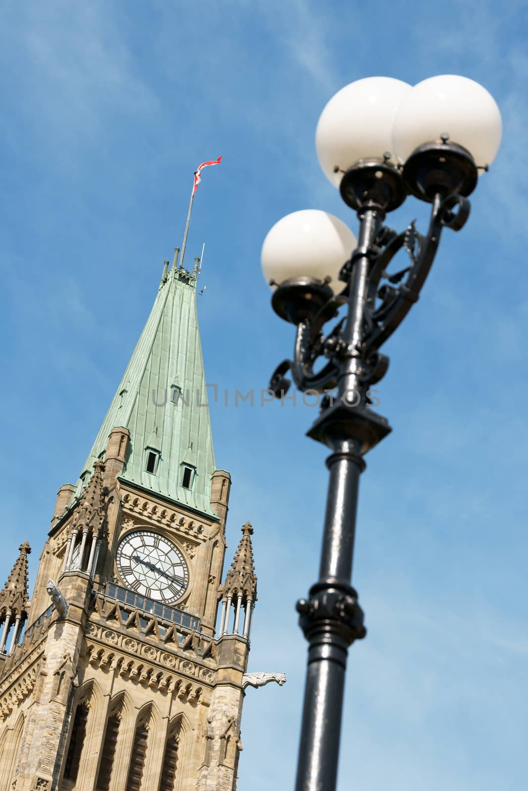 Detail of the clock tower of Parliament of Canada in downtown Ottawa. Selective focus on the building.