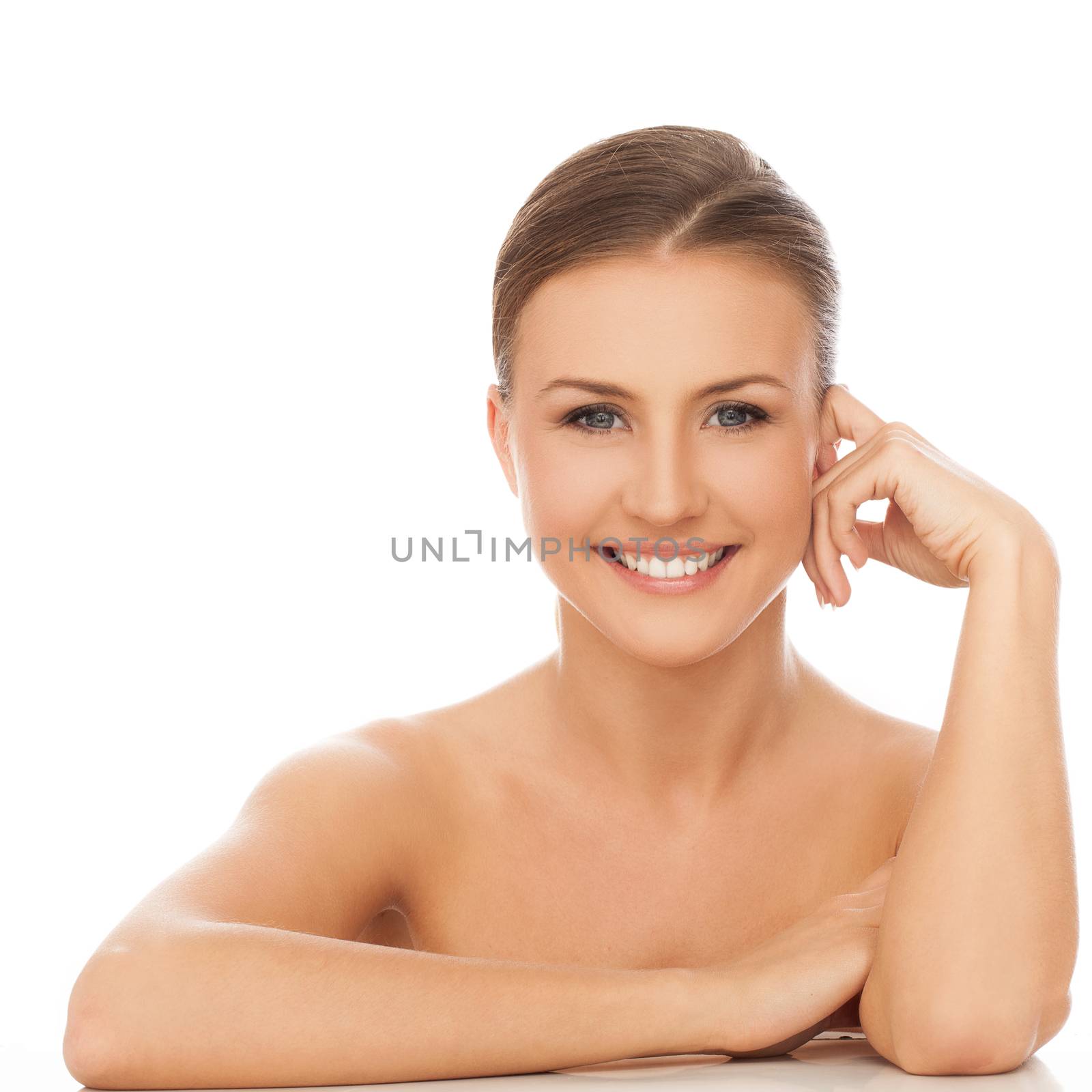 Young happy beautiful natural woman naked over white background