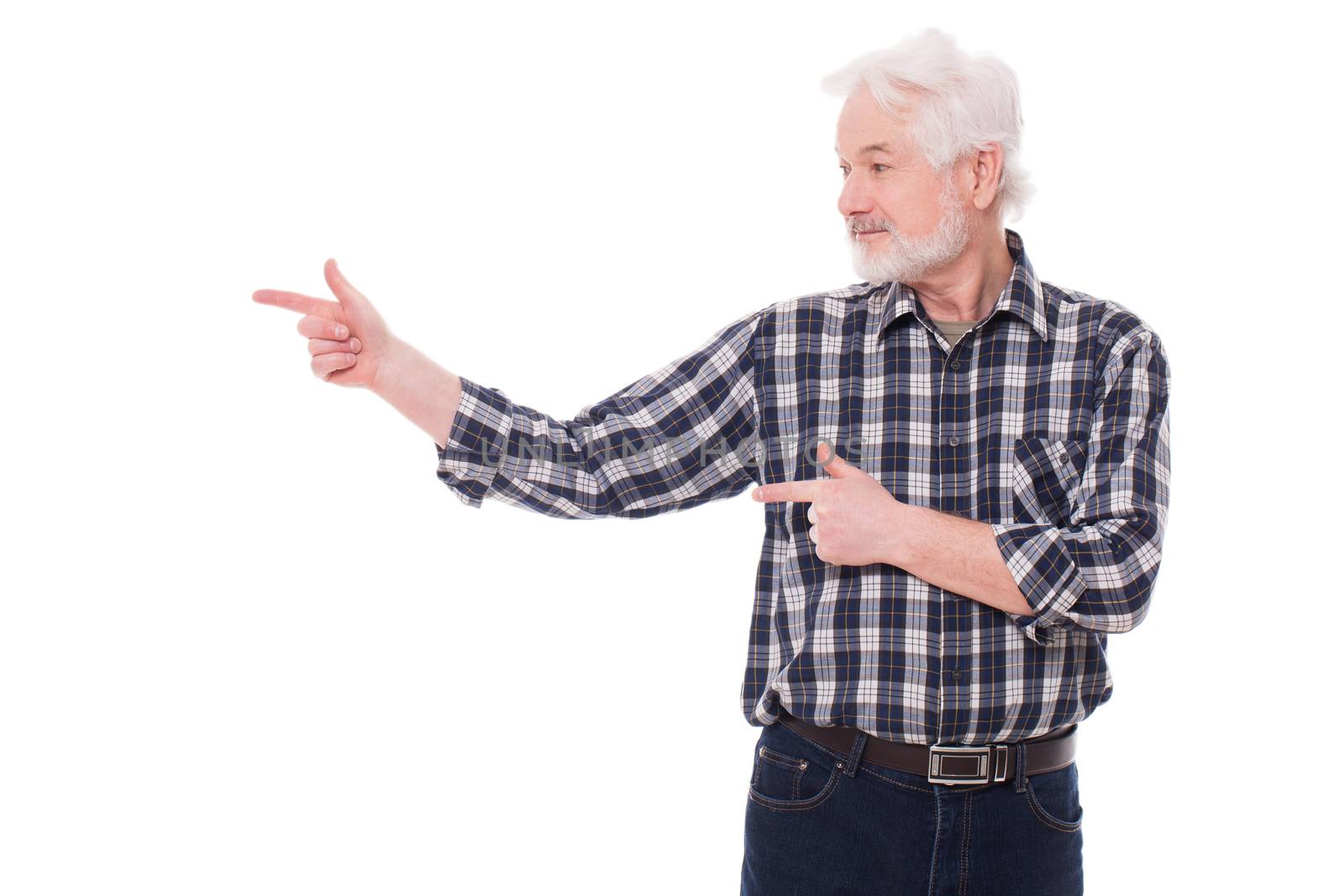 Handsome elderly man with grey beard shows on something isolated over white background