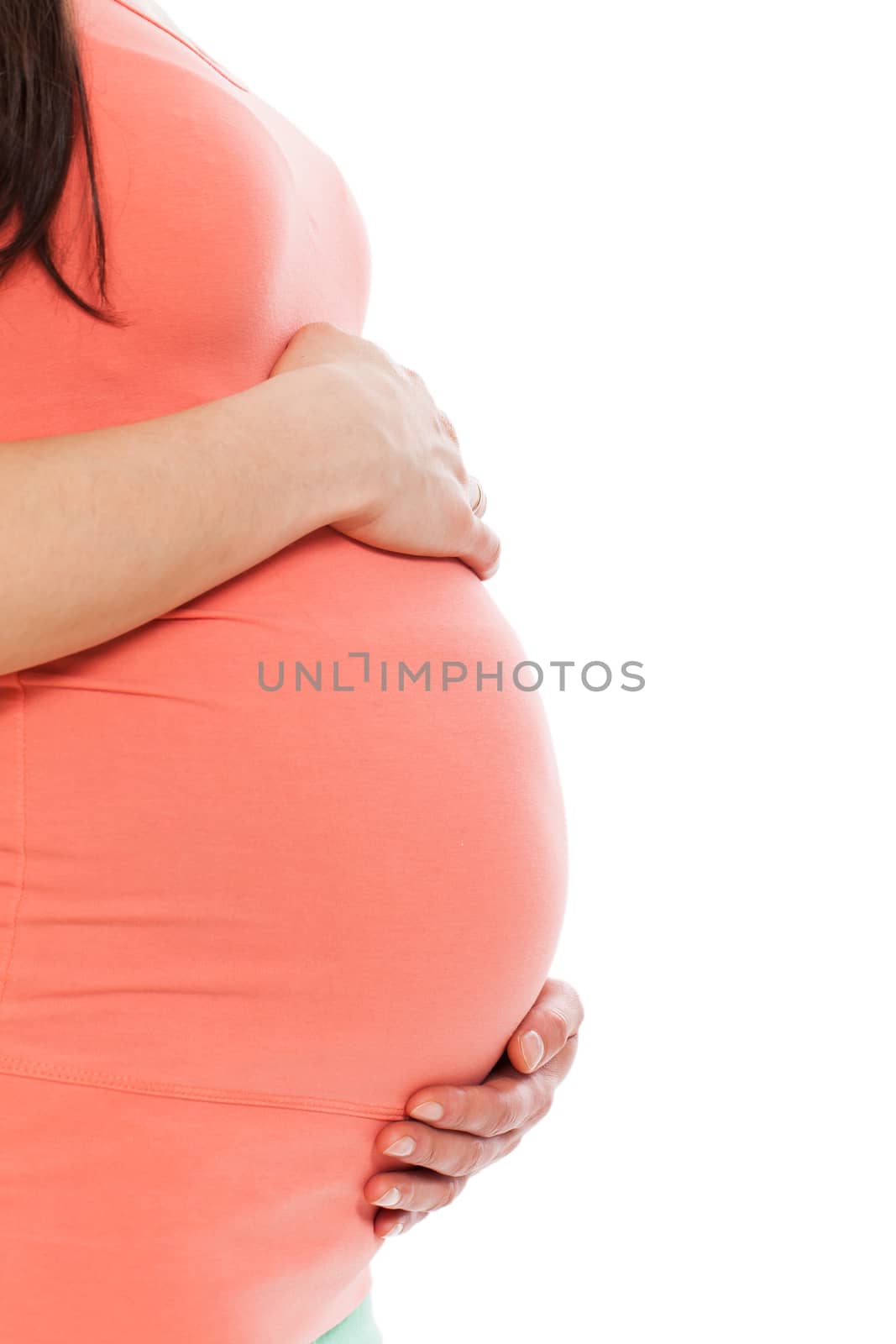 Beautiful pregnant belly on a white background