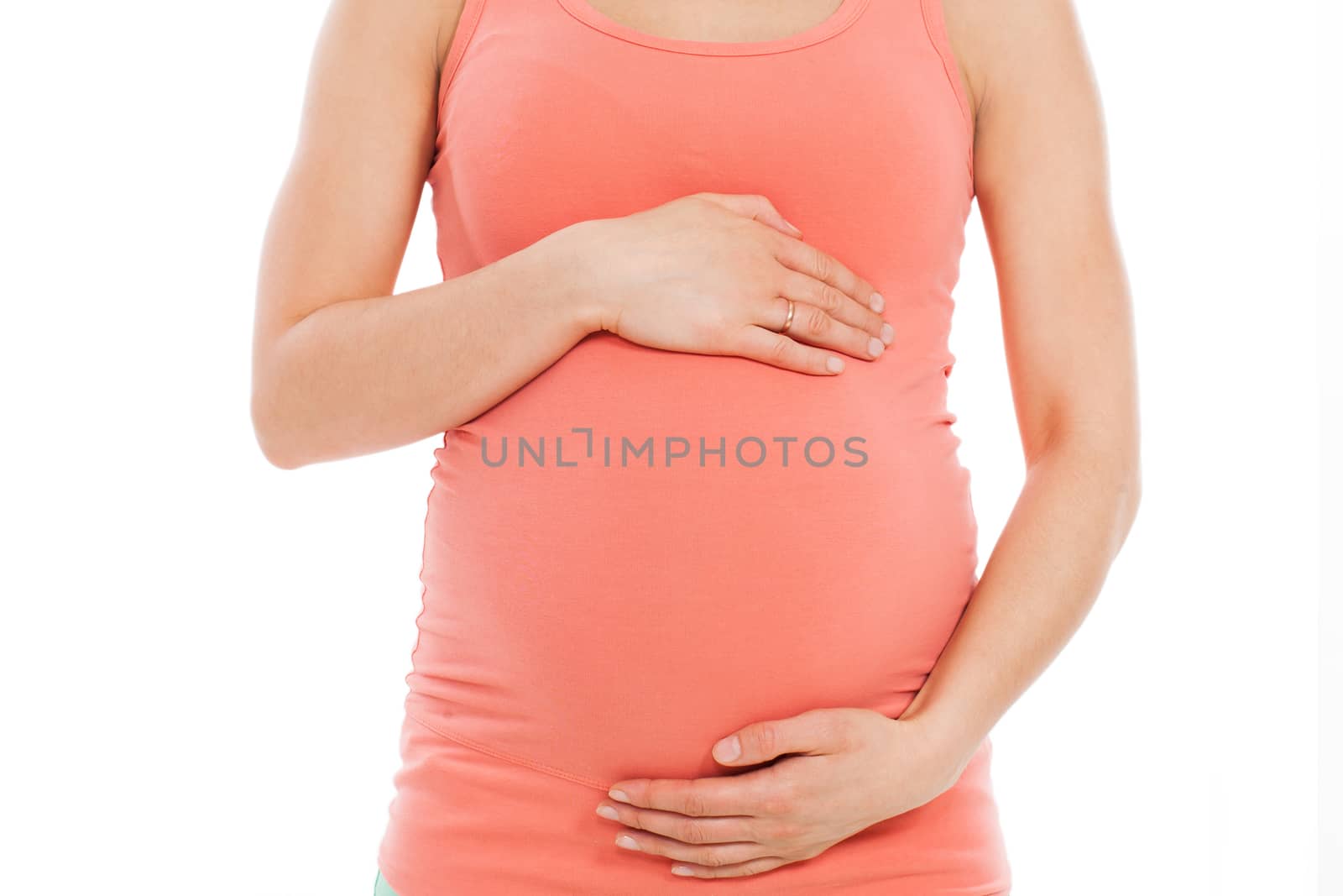 Beautiful pregnant belly on a white background