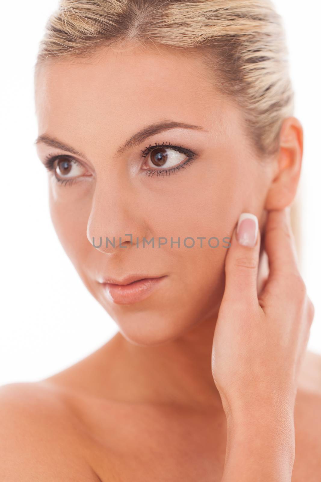 Closeup portrait of beautiful caucasian woman with day makeup