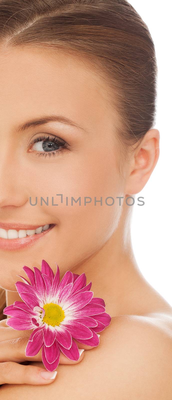 Young beautiful natural woman with flower