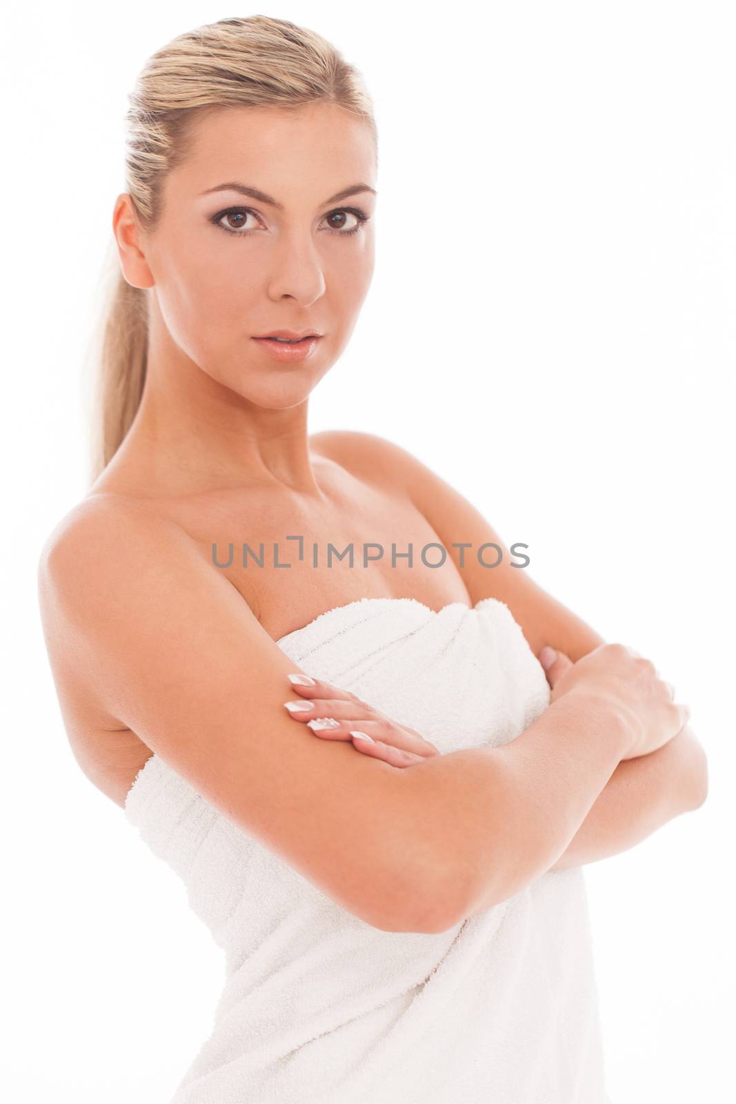 Beautiful caucasian woman in towel isolated over white background