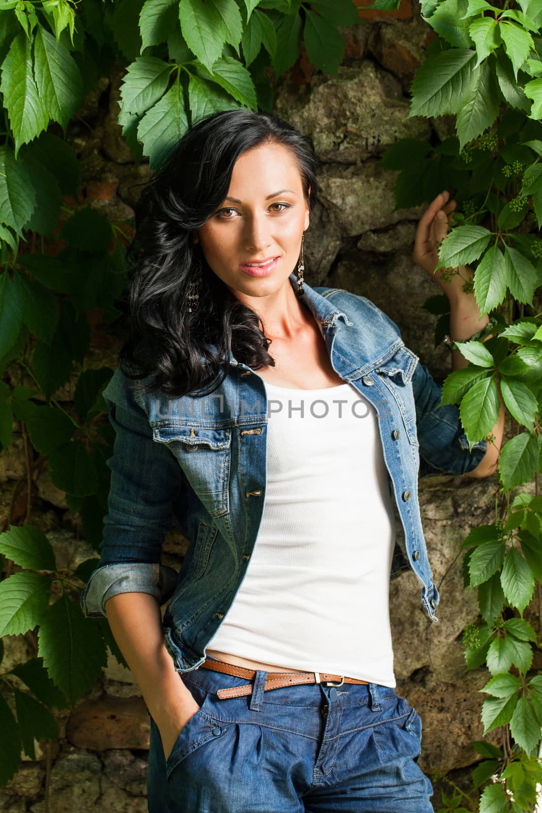 Beautiful young caucasian woman in a park