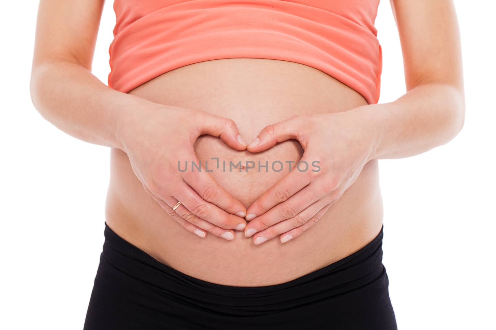 Beautiful pregnant belly on a white background