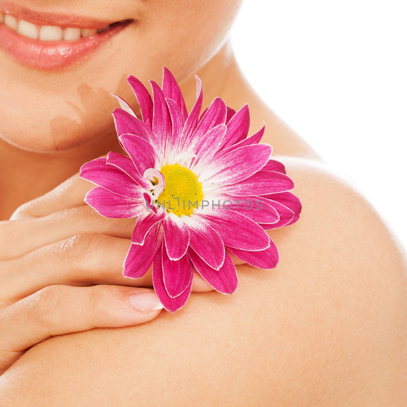 Young beautiful natural woman with flower