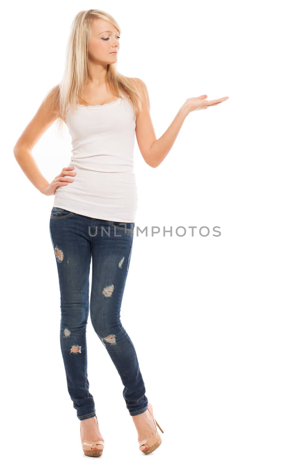 Young attractive woman holds something isolated over white background