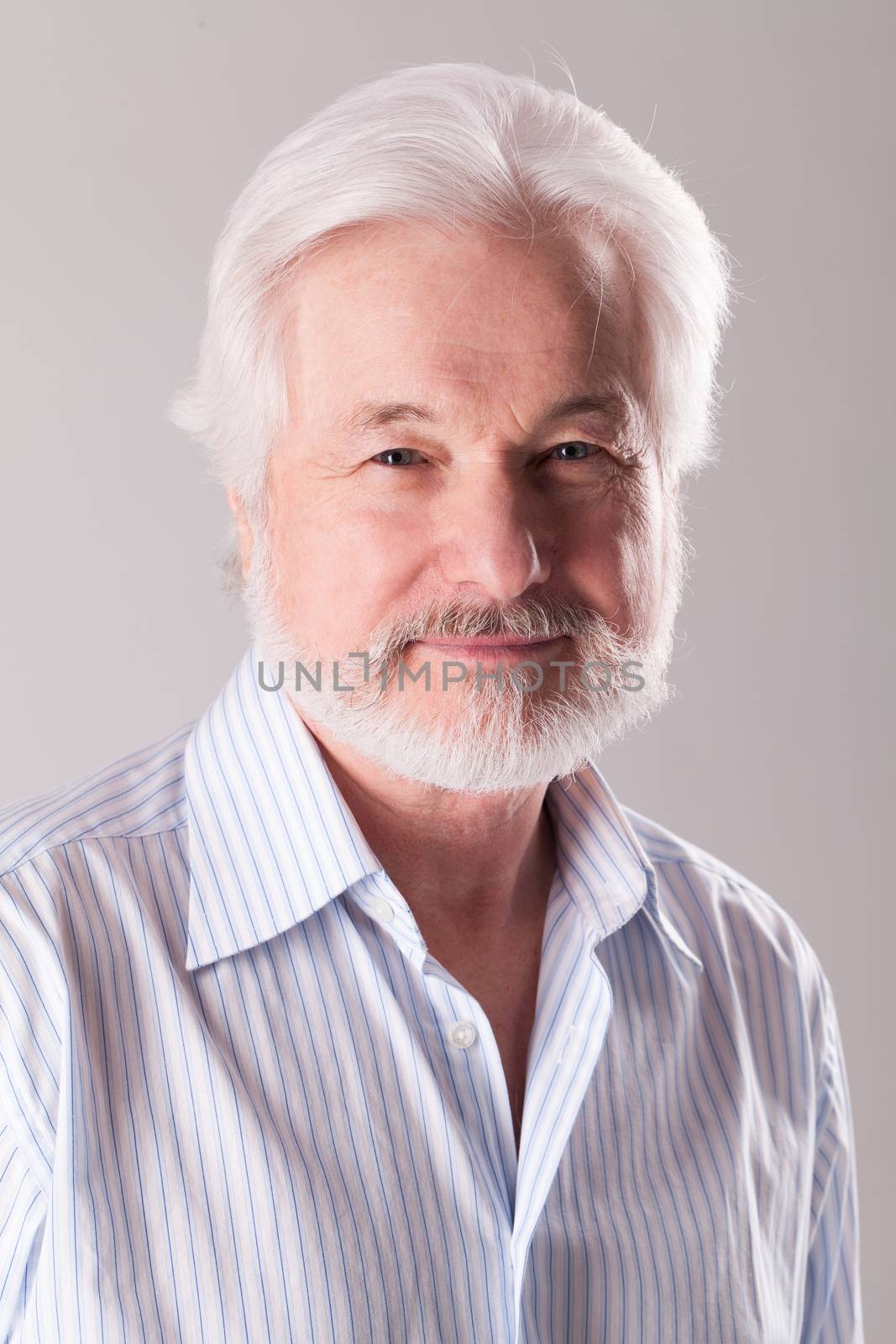 Handsome, elderly man with white beard