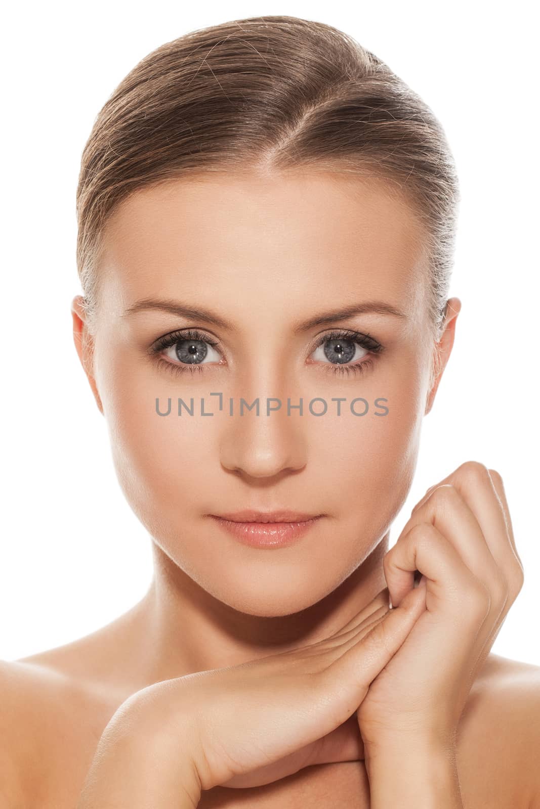 Beautiful natural caucasian woman over white background