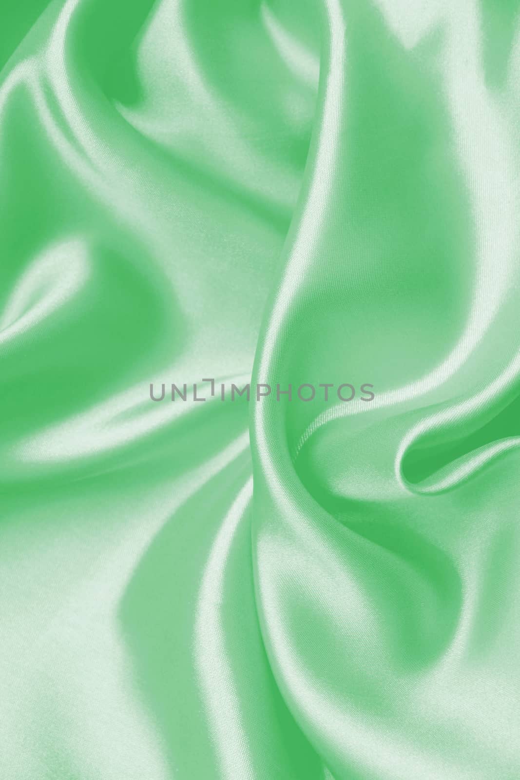 Smooth elegant green silk can use as background 