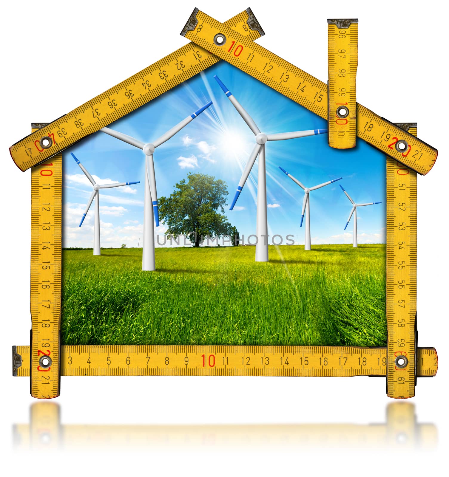 Wooden yellow meter tool forming a ecologic house with wind energy turbine power station inside. Isolated on white background