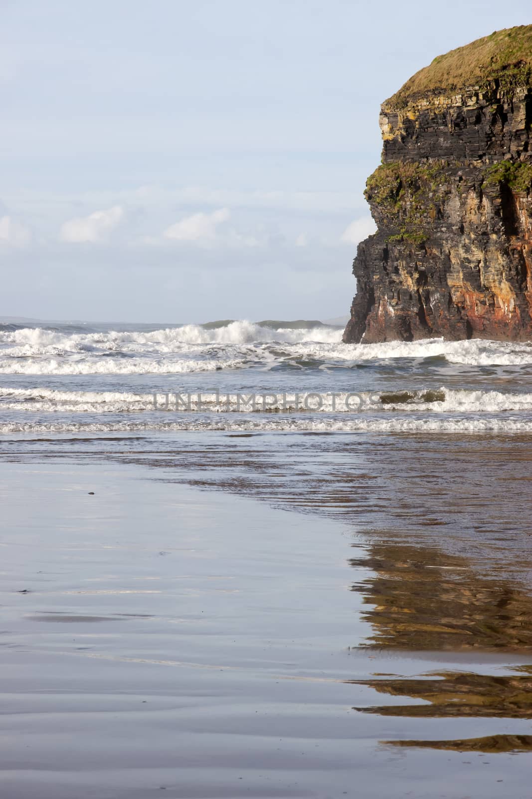 cliffs of Ballybunion with reflections by morrbyte