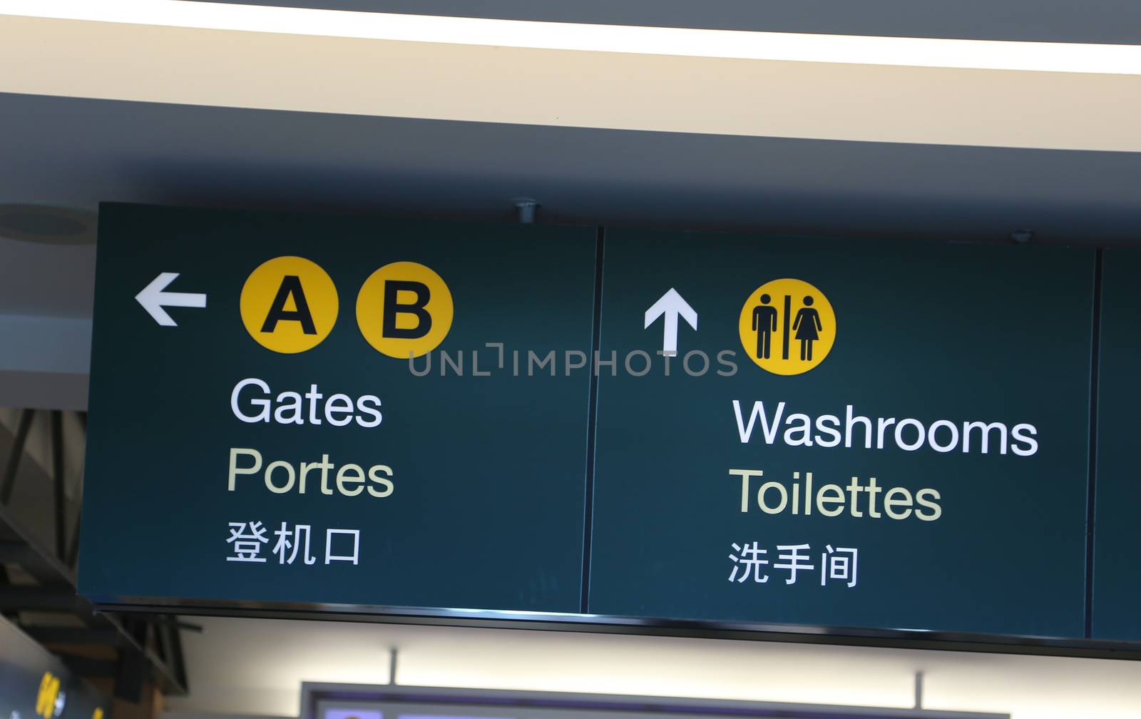Gates and washrooms sign at airport